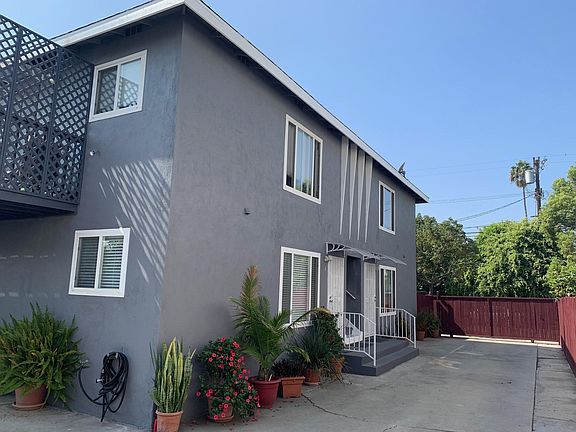 Exterior unit entrance first floor, left side direct door entry