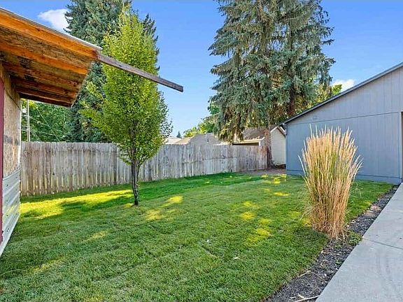 spacious backyard perfect for relaxing or playing with your pets.