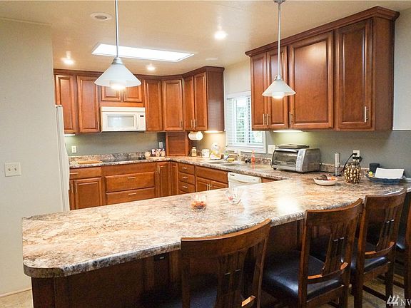 Gorgeous Kitchen with an extended eating bar.