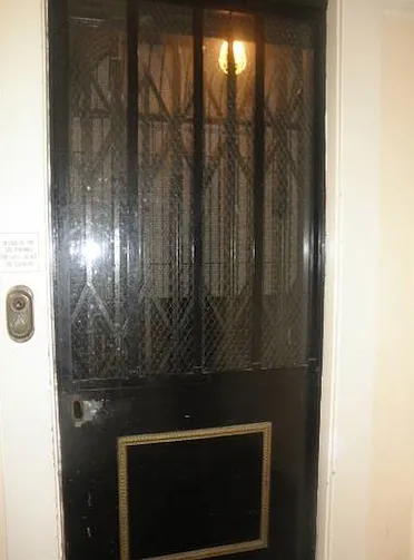 Vintage elevator takes you up to your 4th floor/top floor unit.