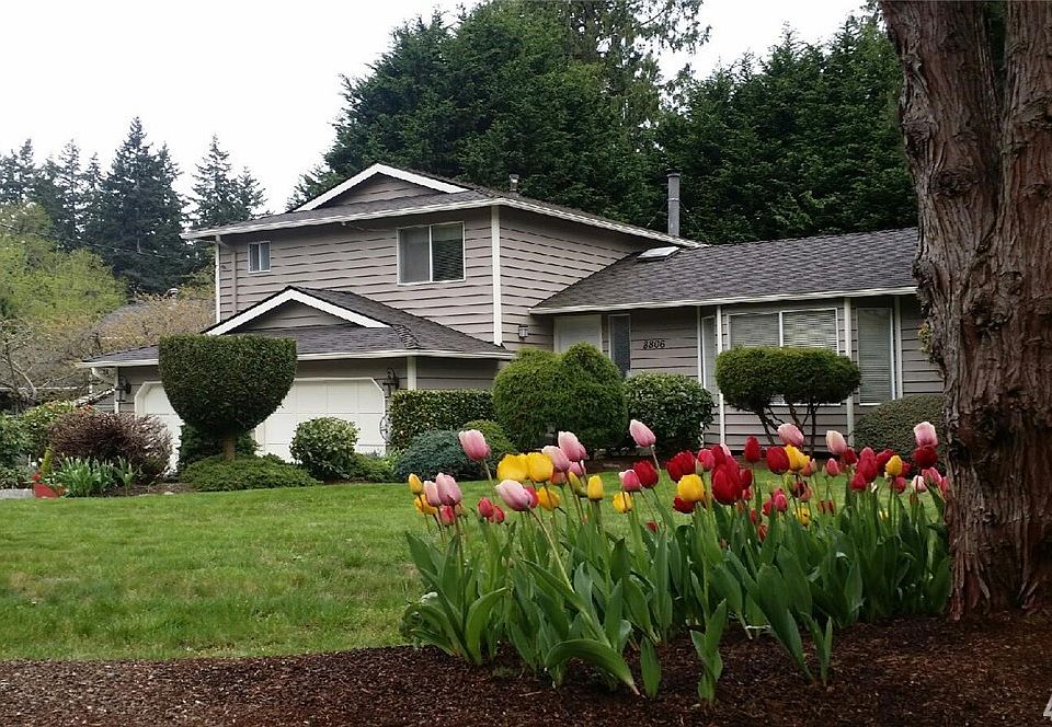 See what this home looks like without the snow!  The yard is beautifully landscaped with flowers blooming in the spring and summer.