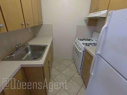 3rd image of 103-11 68th Dr #H