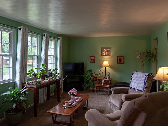 Upstairs living room with tons of natural light