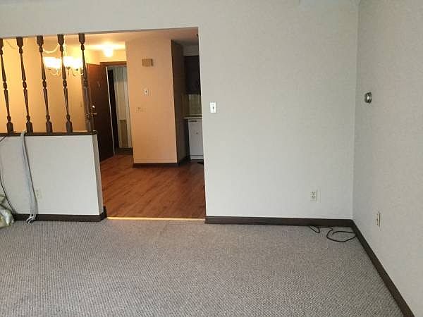 Living room with new carpet & fresh paint