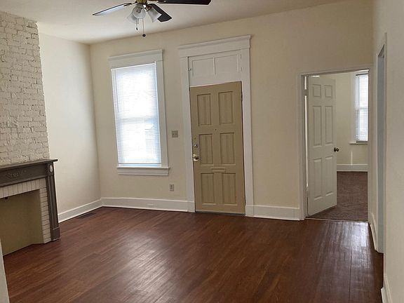 Front entry door in living room, main bedroom to the right.