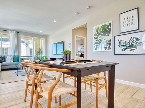 A photo of the dining space in the Citrus Plan 1 Model Home at New Haven.