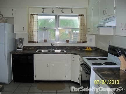 Huge, Elegant Kitchen
						:
						Features new countertops and other fabulous updates