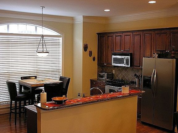 Gourmet Kitchen With Granite Countertops and Stainless Appliances