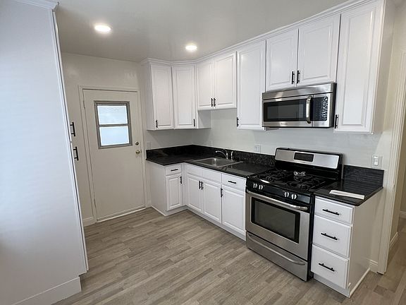 Newley updated kitchen with recessed lighting.