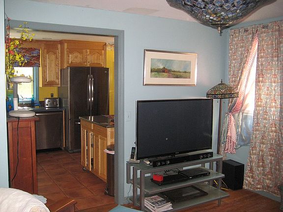 family room looks to kitchen