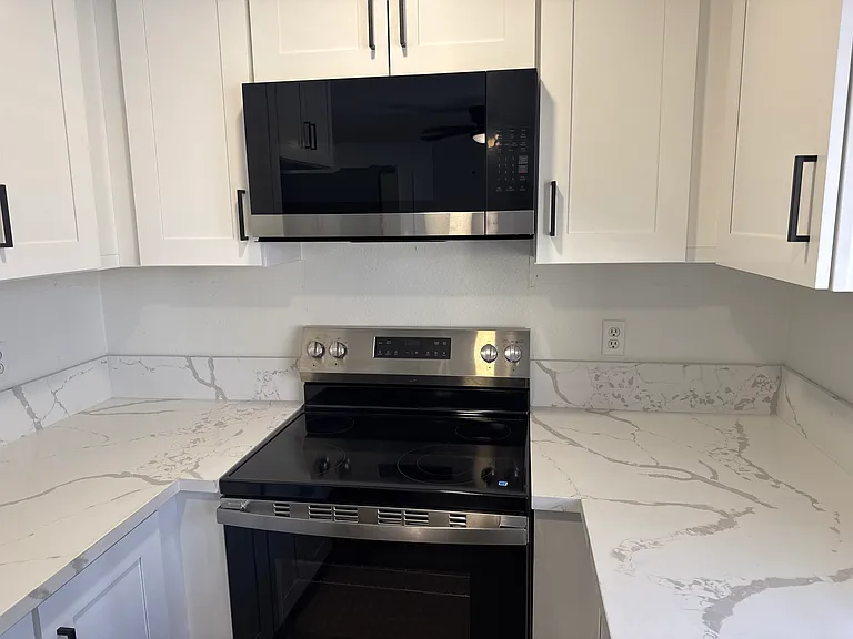 New GE Range with new microwave and vent