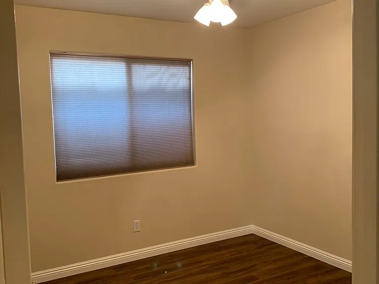 Guest bedroom 1. New paint & baseboards and luxury vinyl plank flooring.