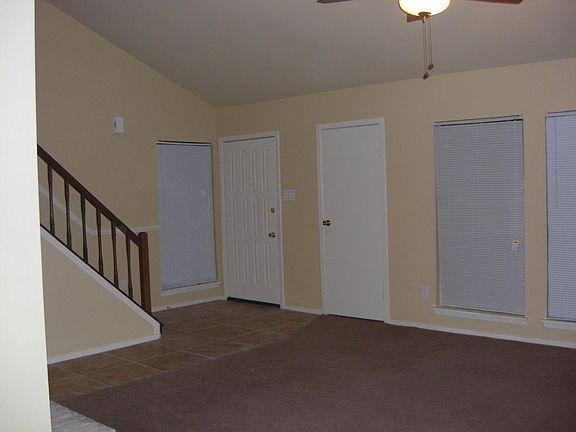 Coat closet nest to the front door, so convenient. Under the stairs is the updated 1/2 bath. Fire place, hang your tv and enjoy some bing watching.