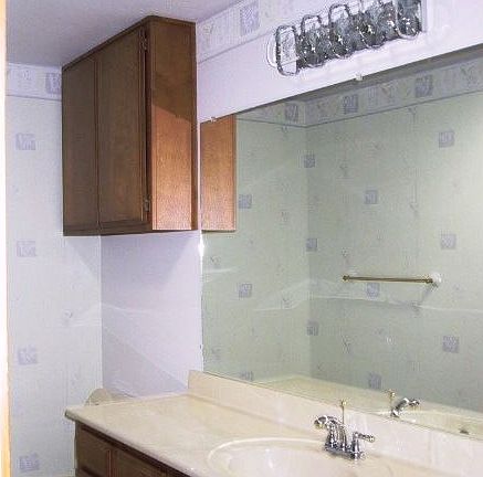 Hall bath with tub/shower, cultured marble.