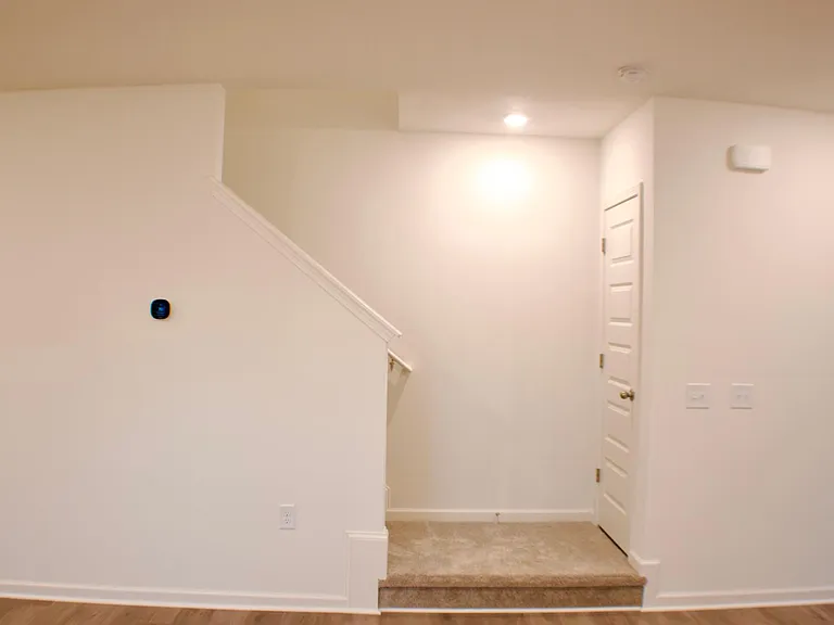 Stairs & Coat Closet