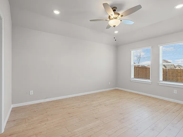 Bedroom with large windows