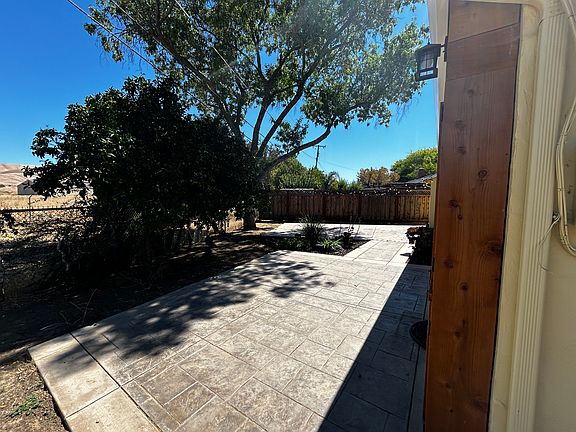 Side view of backyard patios