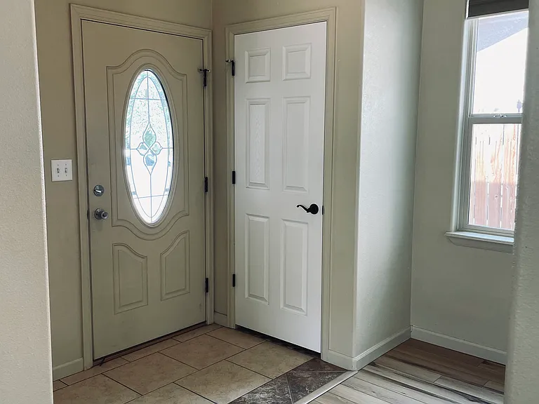 entry way with coat closet