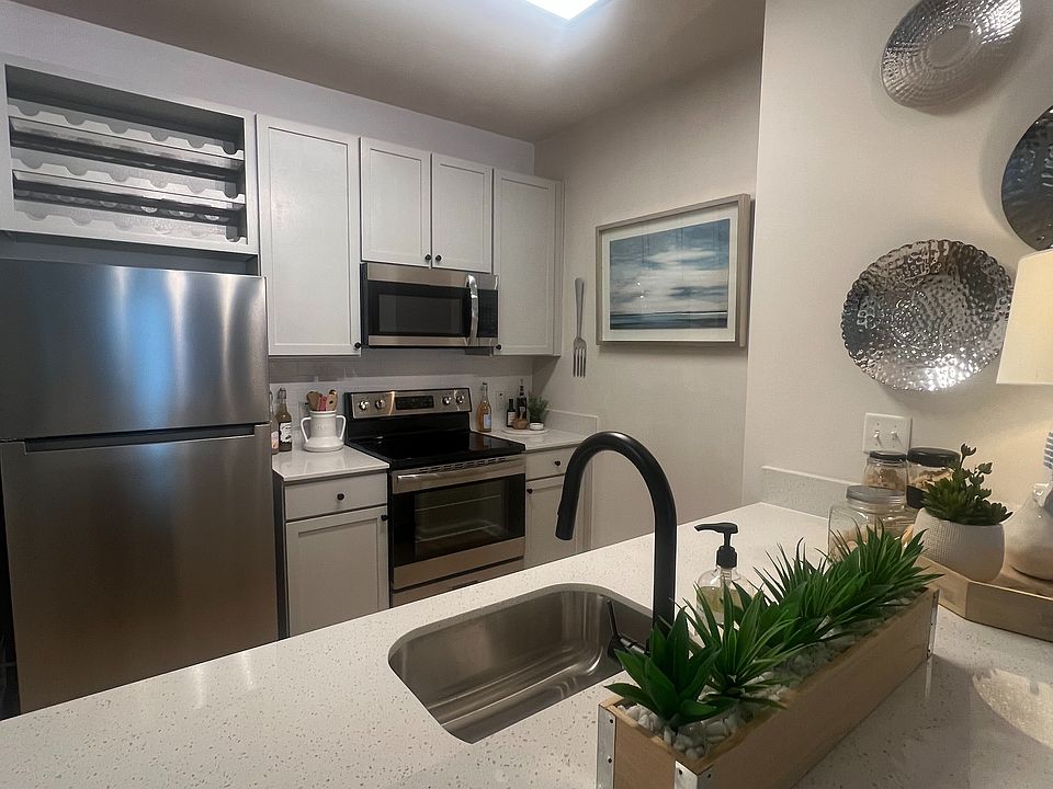 Newly renovated kitchen with Quartz countertops and stainless steel appliances.