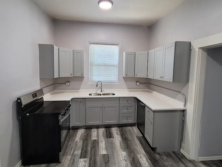 Full kitchen with dishwasher