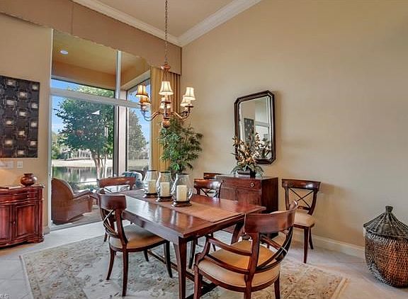 Formal dining with lovely views of lake