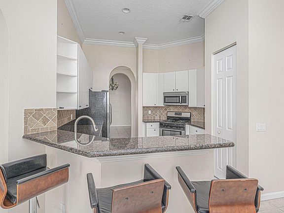 3rd image of 137 NW Magnolia Lakes Blvd