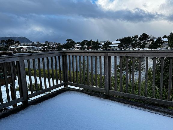 Nice size deck with view of river and Tillamook head