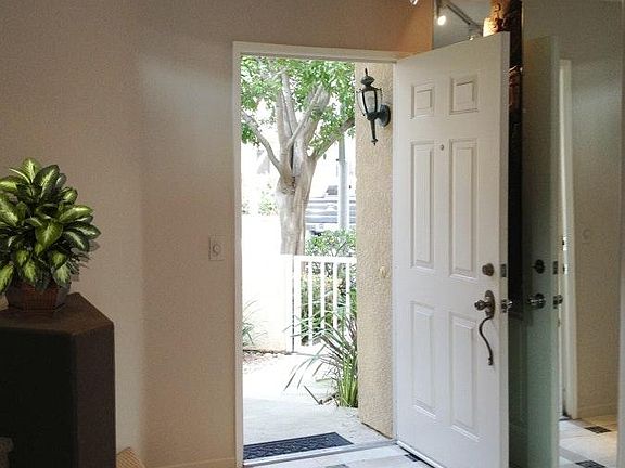 Tiled entry looking out