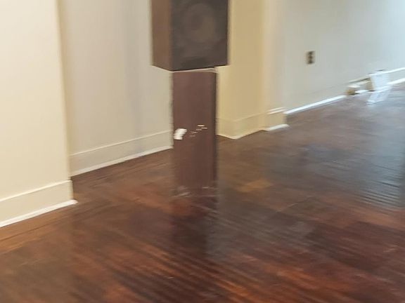 Living room dinning room combination. New walls and floors that's this house great and looking for for a person to make it a home