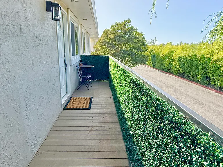 Tranquil tree-lined views from the balcony deck