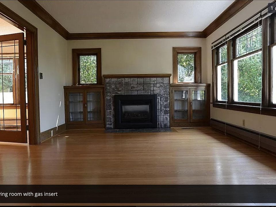 Front room with gas insert in the fireplace.