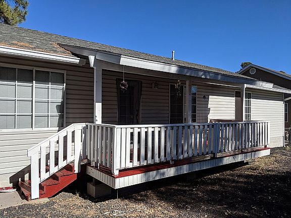 Back view with covered porch