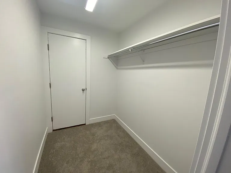Walk-in closet in main bedroom