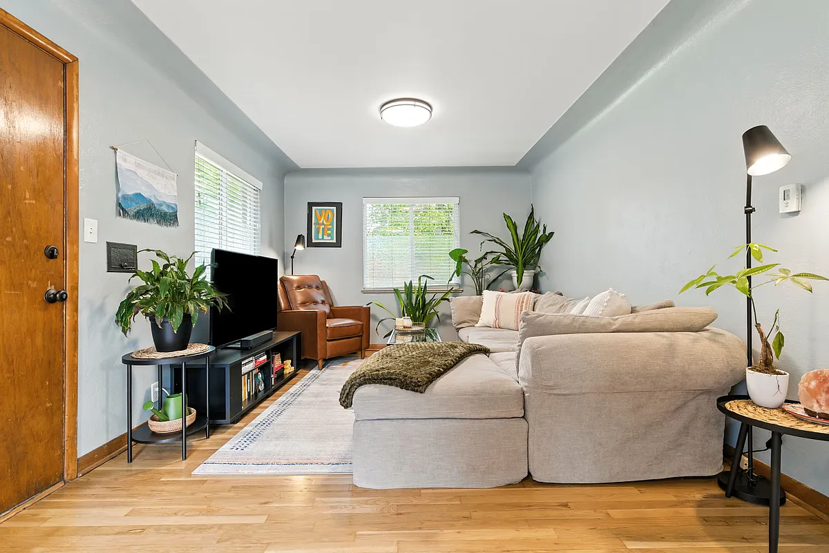 Living room with large windows and natural lights - 4470 Federal Blvd