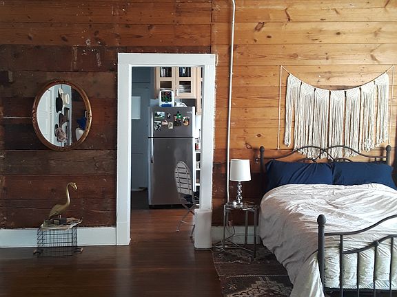 Exposed wood walls and ceiling