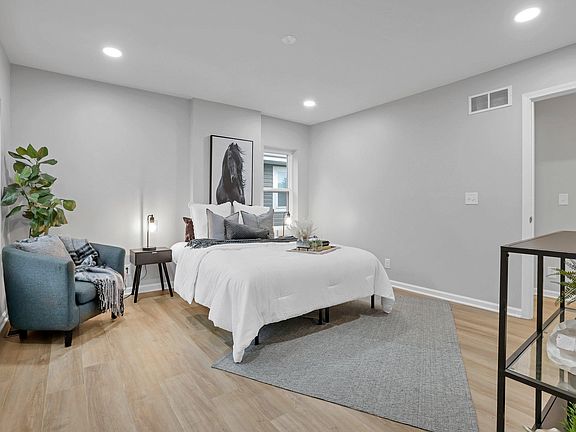 Design-layout luxury bedroom with extra windows on a corner townhome with gorgeous natural light. Central heating and air! MODERN living.