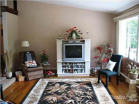 Upstairs formal living room with picture window