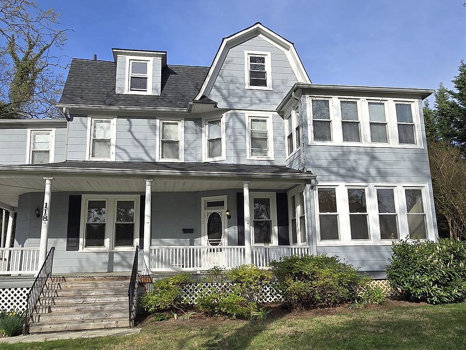 Front view of the property. Apartment #1 is on the first floor. The 4 windows on right belong to the sun porch in Apartment #1.
