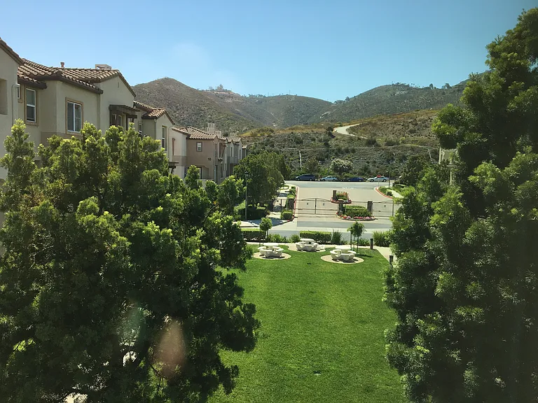 Picnic tables and lawn for picnics with hillside views