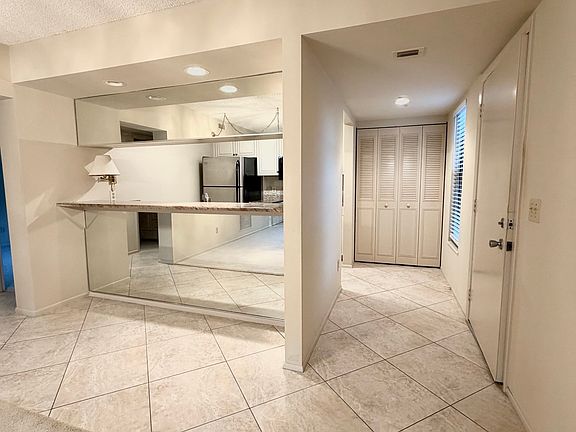 Kitchen w/ breakfast bar, spacious pantry & window