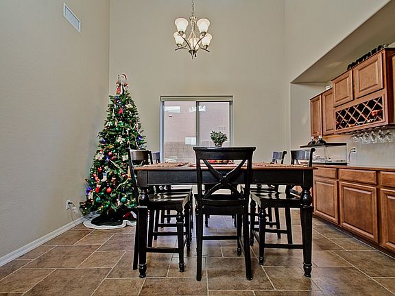 Formal dining with maple built ins and cathedral ceiling