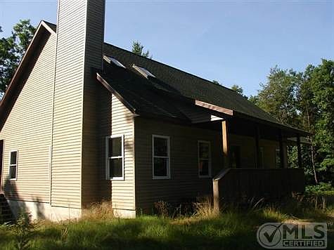 Front of home, covered front porch/front entry.