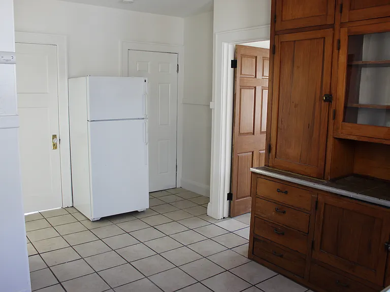 Spacious kitchen with plenty of storage.