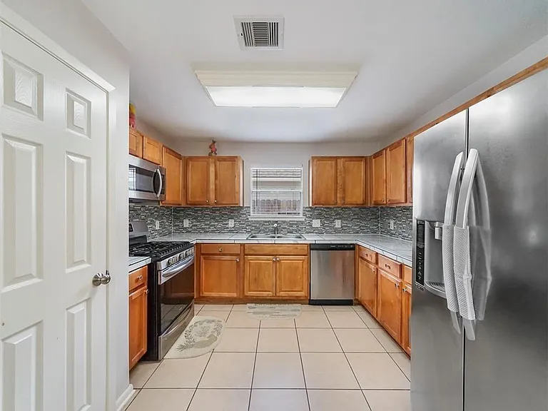 6619 Wellington Meadows Dr — Photo 10