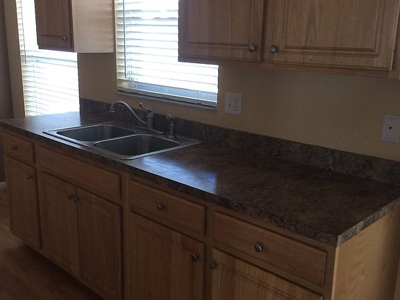 Natural Real Wood Cabinets, and Great Views of the Back Yard!