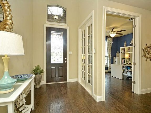 Entry foyer with view of office/study.