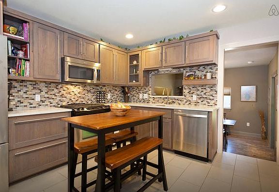 Custom cabinets, stainless steel appliances