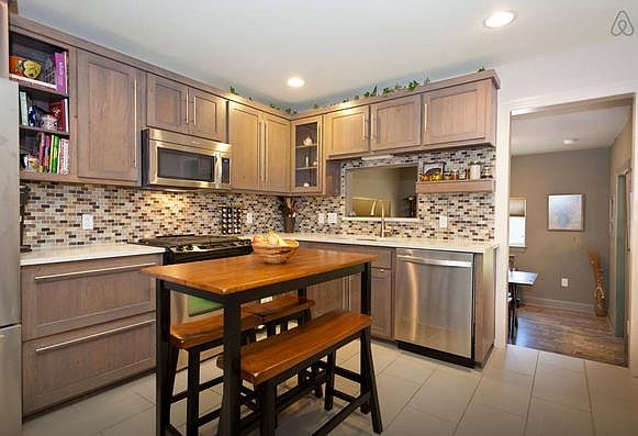 Custom cabinets, stainless steel appliances