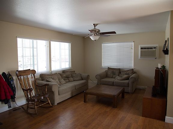 Living room with new in-wall A/C unit