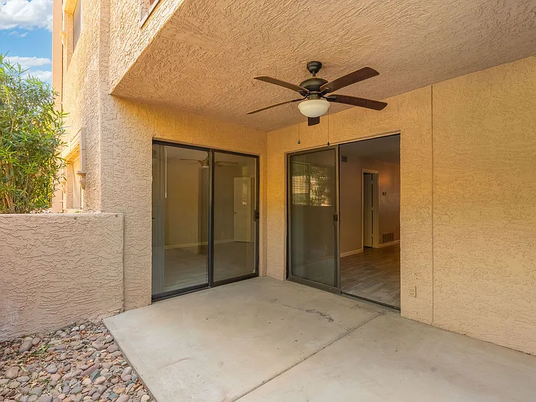 Private patio w/ access from living room & primary suite #1